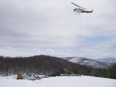 Helicpoter Working in Snow at St. Mary's River in VA Photo of the helicopter working on the St. Mary's project in Virginia after snow.