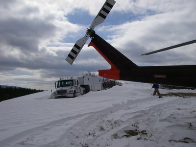 Photo of Fuel Truck and Helicopter Working on St. Mary's Project Photo of Fuel Truck and Helicopter Working on St. Mary's Project in Virginia.  Around 22 inches of snow fell the day before this photo.